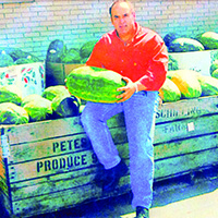 Jimmy Dremoras holding watermelon
