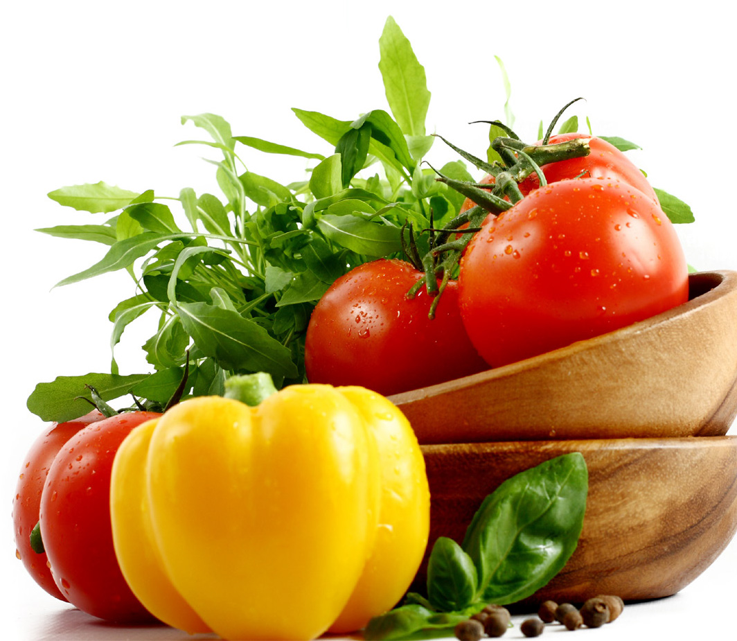 image showing fresh tomatoes in a wooden bowl